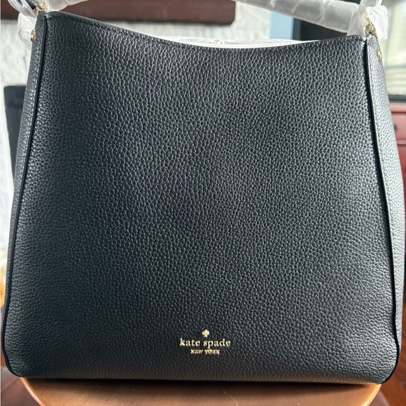kate spade Handbags - kate spade black pebbled leather shoulder bag with gold logo